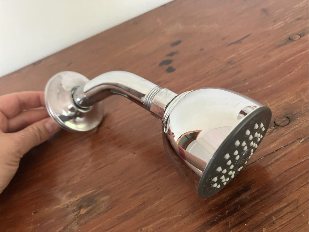 Delta Fundamentals RP38357 2.0 gpm Shiny Chrome Shower Head and 6" Shower Arm
